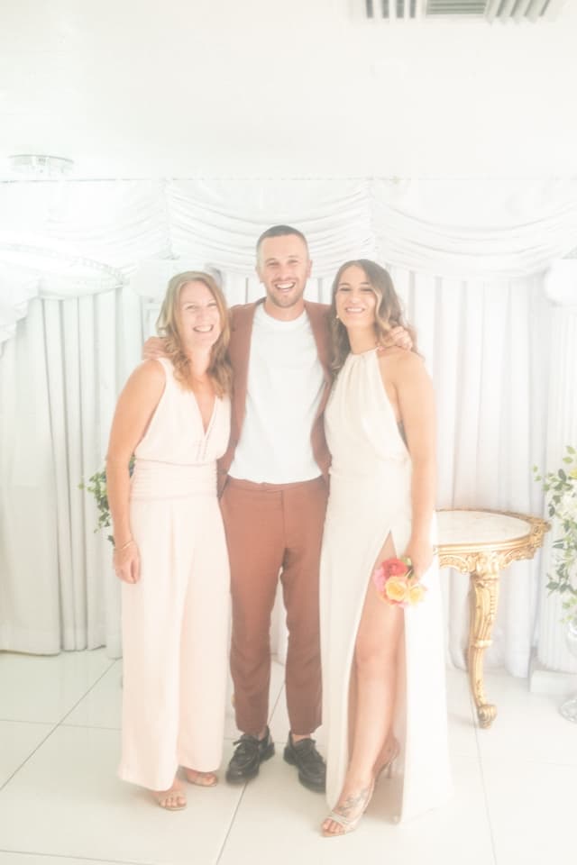 Sam with family at a celebration